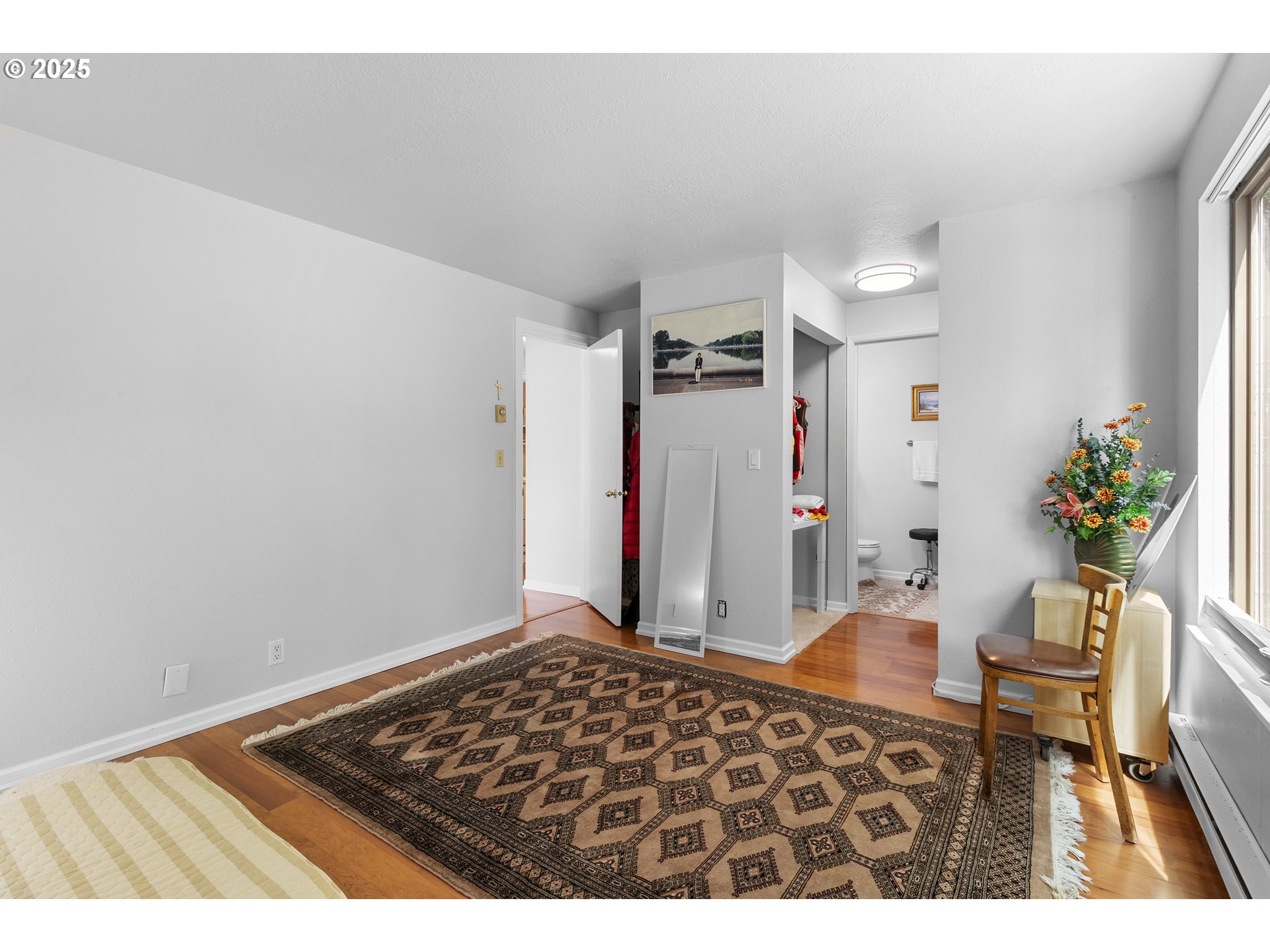 10137 Southwest Trapper Terrace Beaverton, OR 97008 - Photo 20 of 39 a living room with a rug and a table