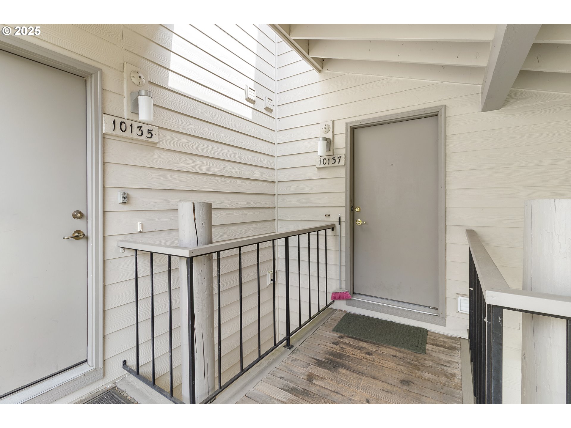 10137 Southwest Trapper Terrace Beaverton, OR 97008 - Photo 2 of 39 a view of a porch with wooden floor