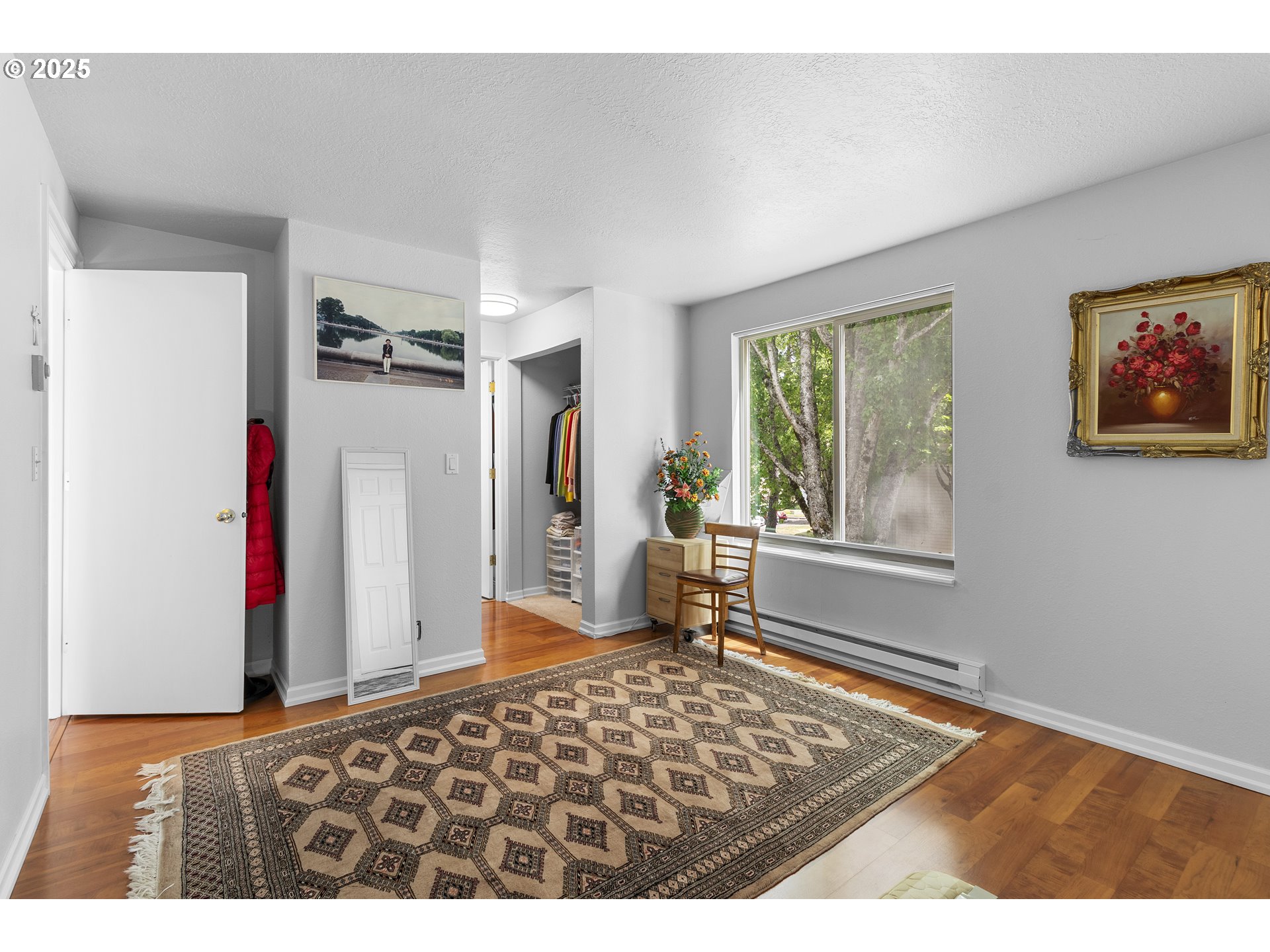 10137 Southwest Trapper Terrace Beaverton, OR 97008 - Photo 21 of 39 a bedroom with a bed and a window