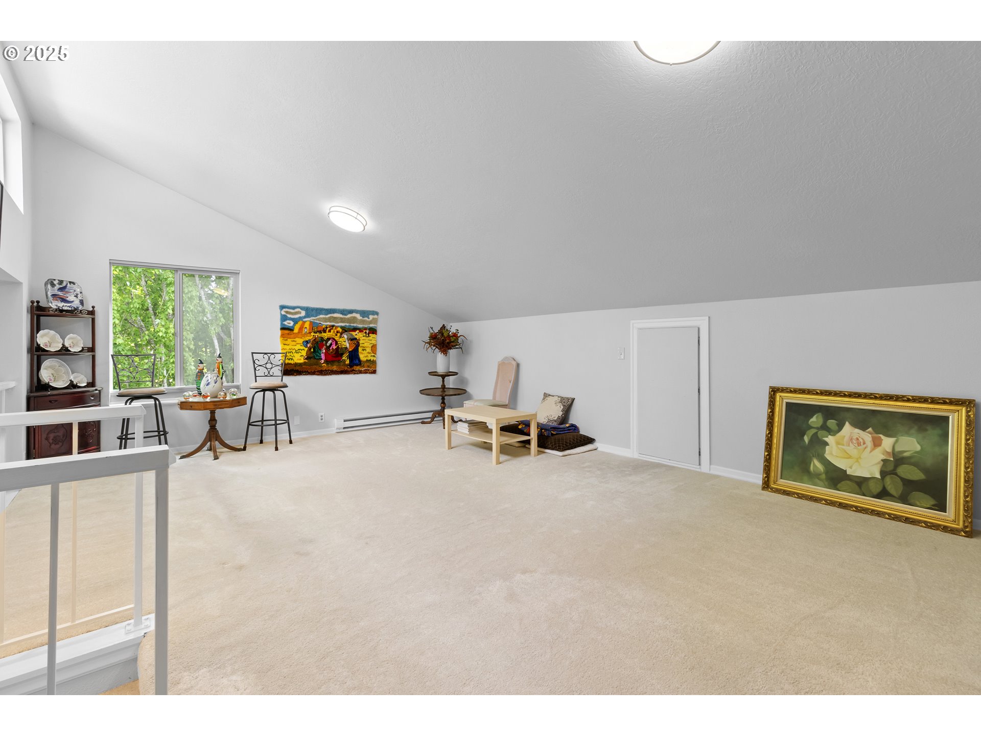 10137 Southwest Trapper Terrace Beaverton, OR 97008 - Photo 26 of 39 a view of a livingroom with furniture and window
