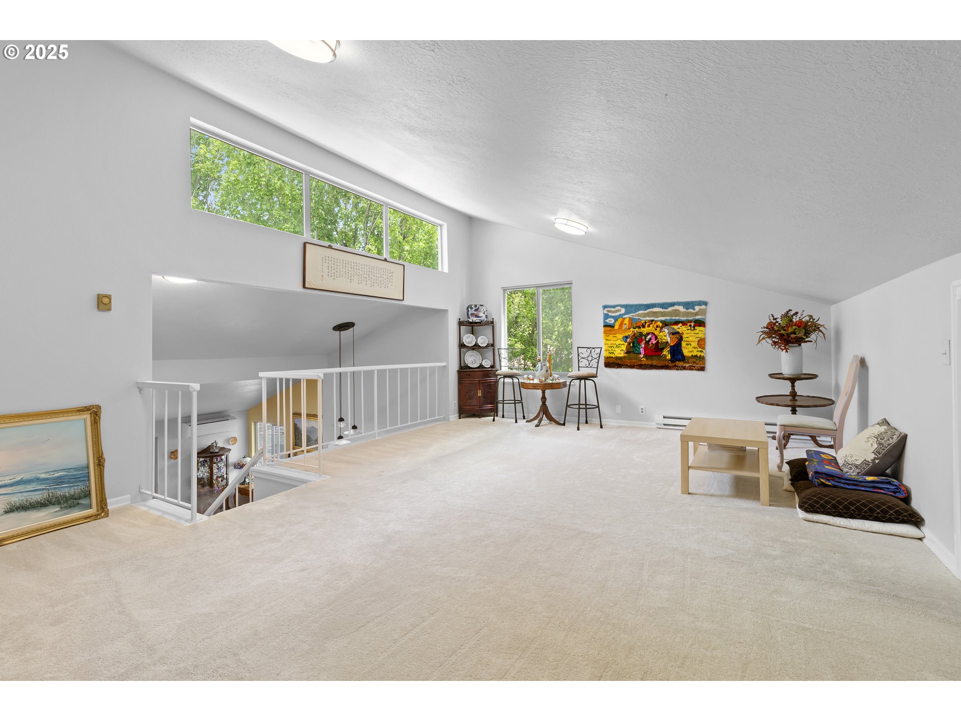10137 Southwest Trapper Terrace Beaverton, OR 97008 - Photo 28 of 39 a room with furniture and a window