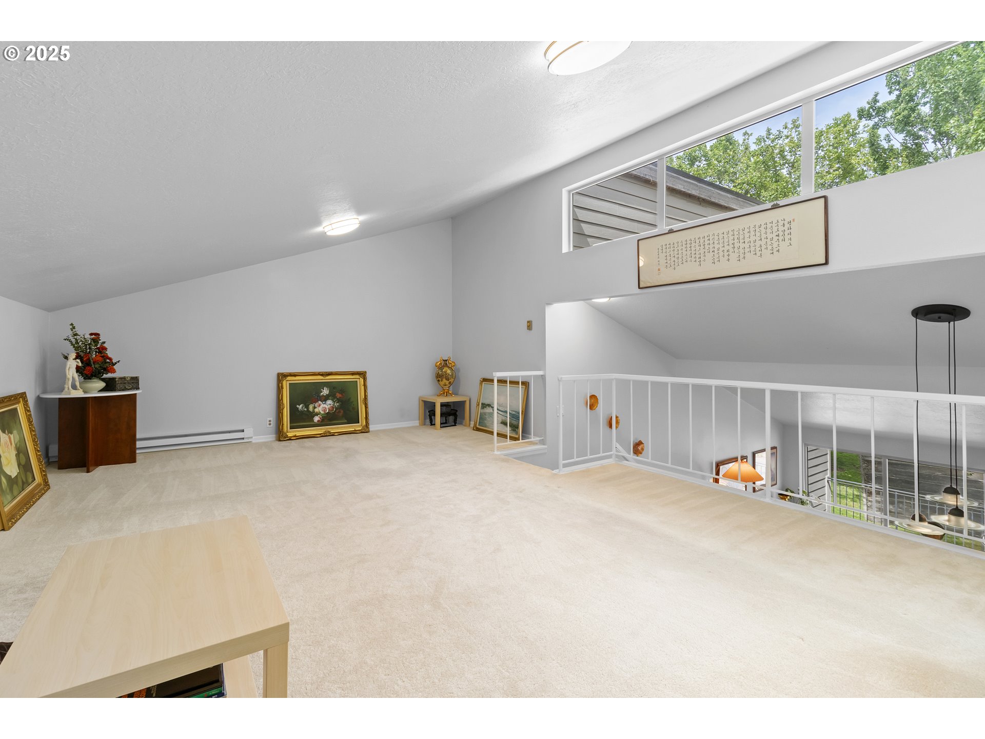 10137 Southwest Trapper Terrace Beaverton, OR 97008 - Photo 29 of 39 a view of a livingroom with furniture and a floor to ceiling window