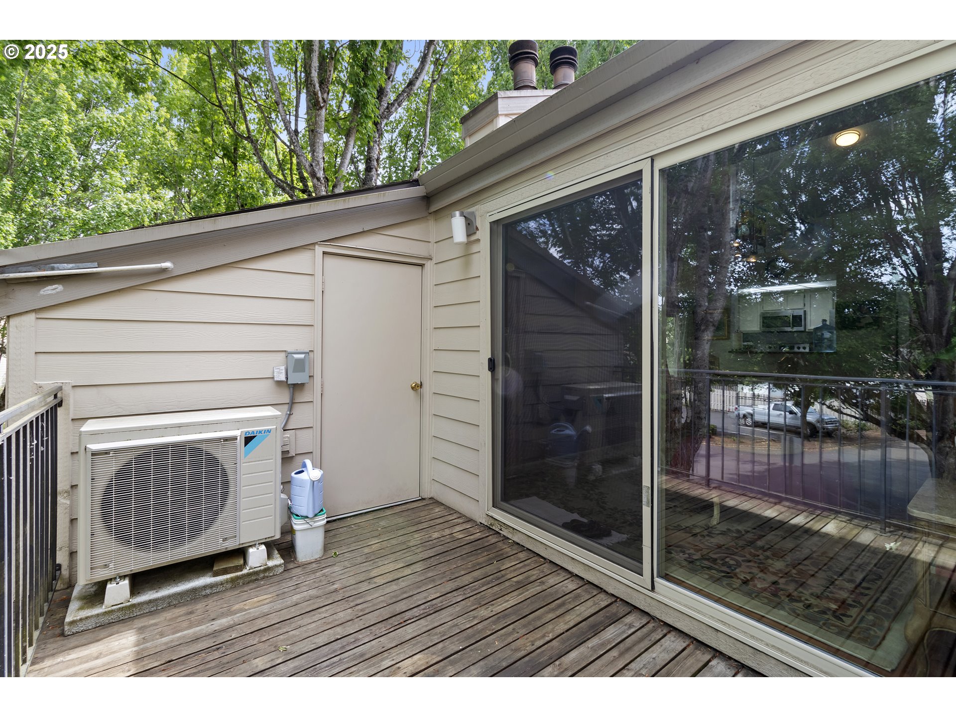 10137 Southwest Trapper Terrace Beaverton, OR 97008 - Photo 33 of 39 a outdoor view of a glass door with a yard