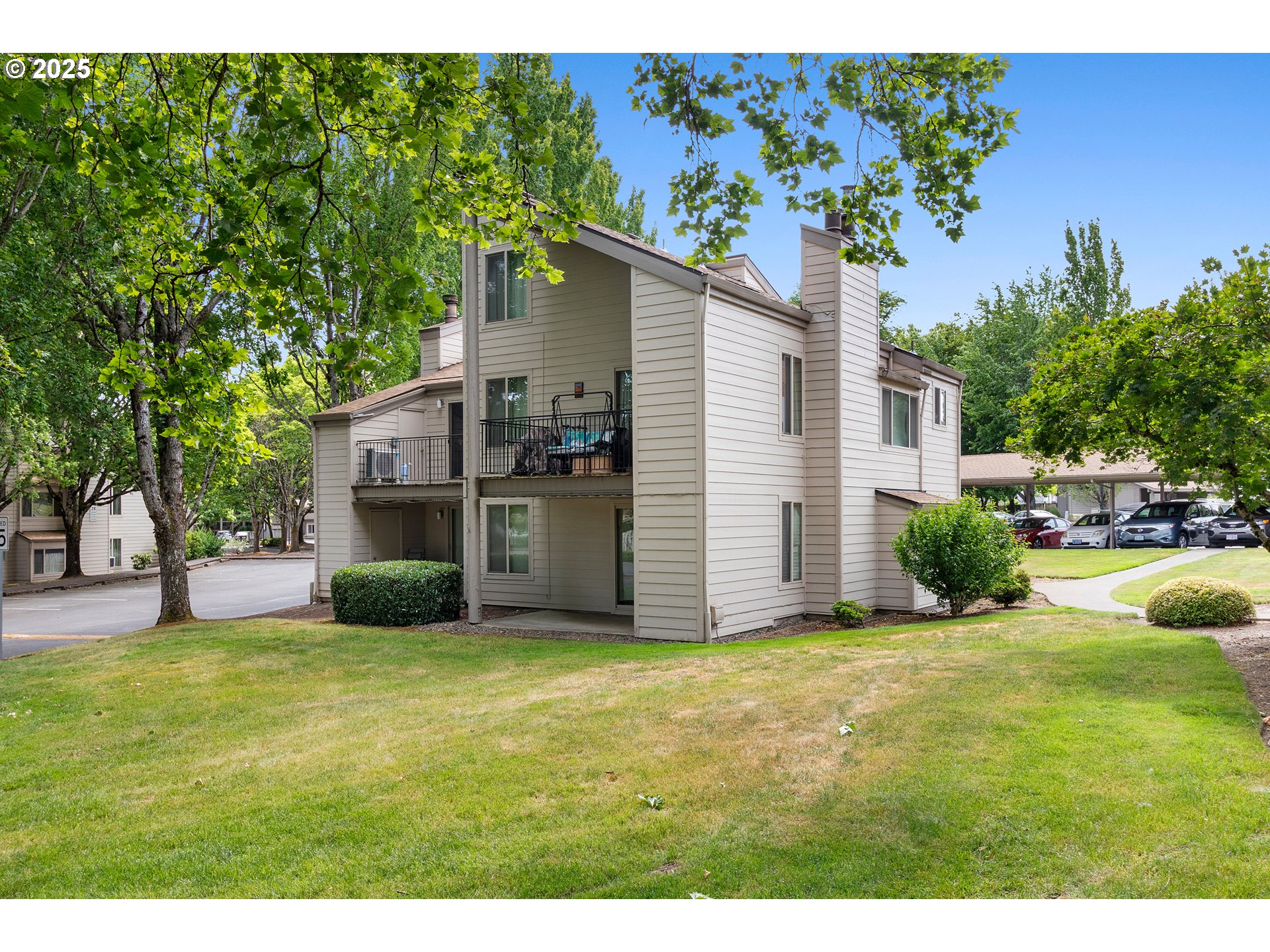 10137 Southwest Trapper Terrace Beaverton, OR 97008 - Photo 37 of 39 a view of an house with backyard space and tree