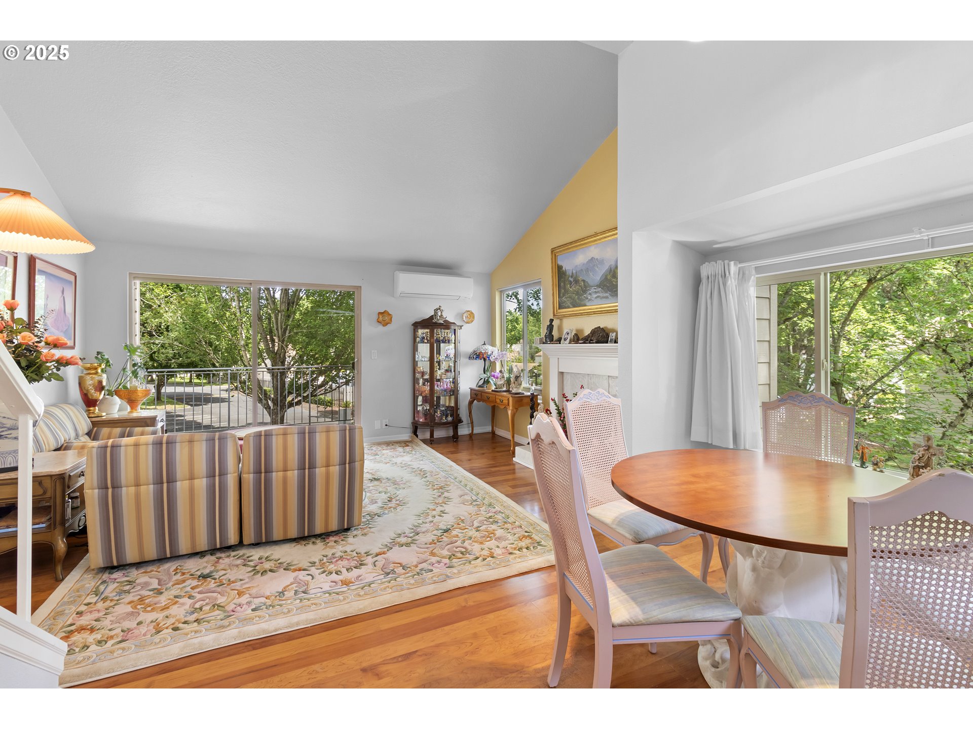 10137 Southwest Trapper Terrace Beaverton, OR 97008 - Photo 9 of 39 a view of a dining room with furniture window and wooden floor