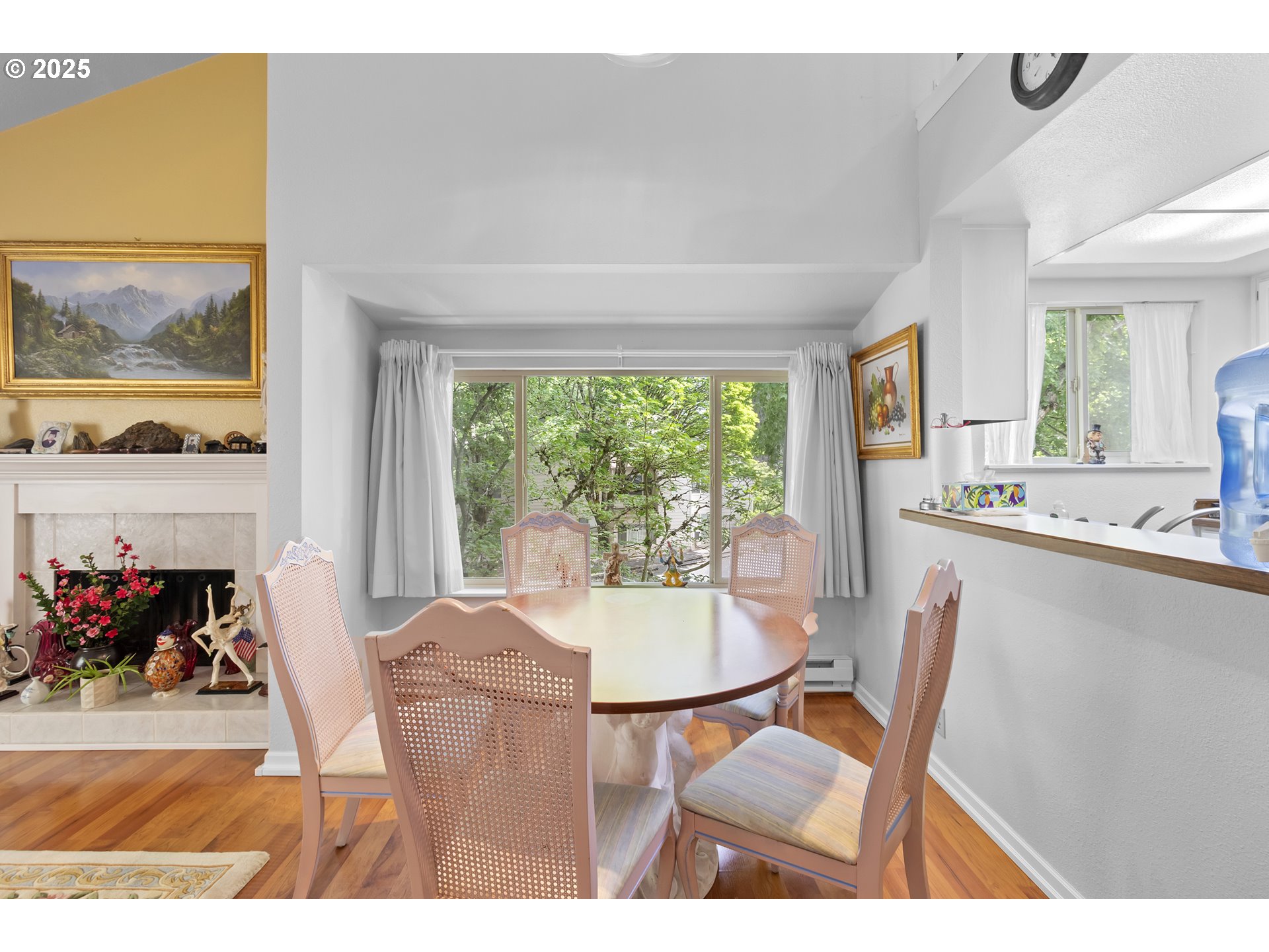 10137 Southwest Trapper Terrace Beaverton, OR 97008 - Photo 10 of 39 a dining room with furniture and a large window