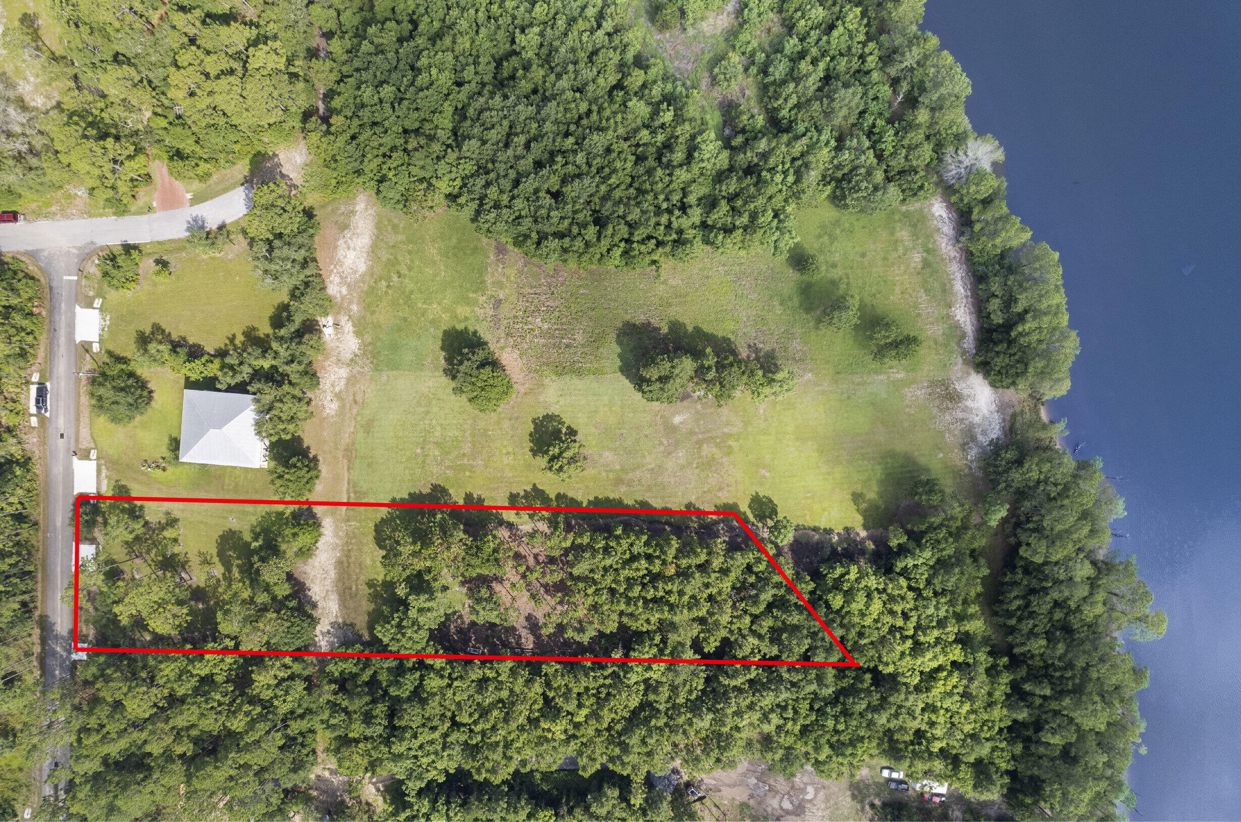 378 Eve Circle, Unit VACANT LOT Santa Rosa Beach, FL 32459 - Photo 1 of 7 a view of a garden with flowers