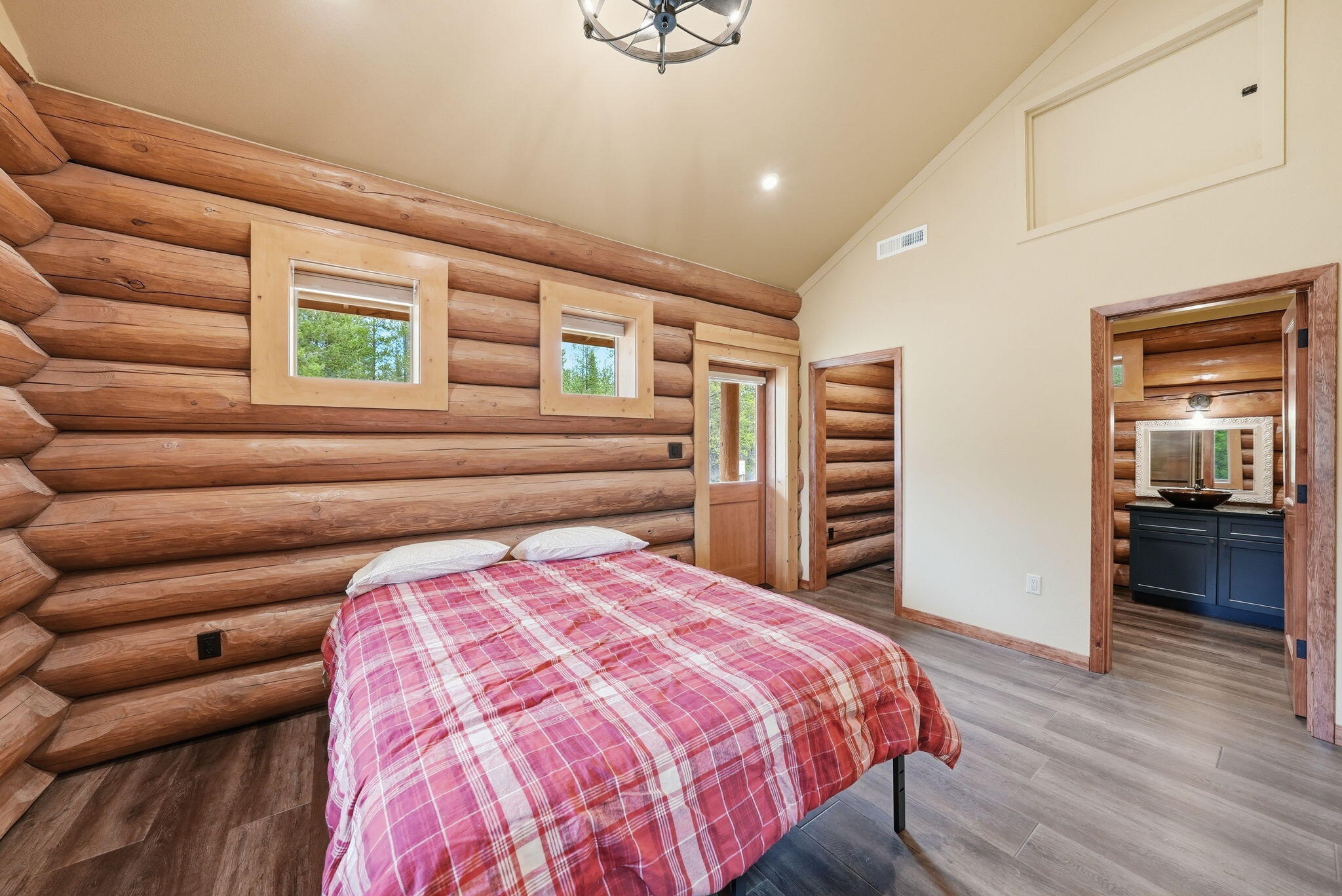 54270 Huntington Road La Pine, OR 97739 - Photo 13 of 68 a bedroom with a bed and a walk in closet