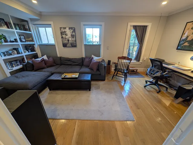 a workspace with furniture and wooden floor