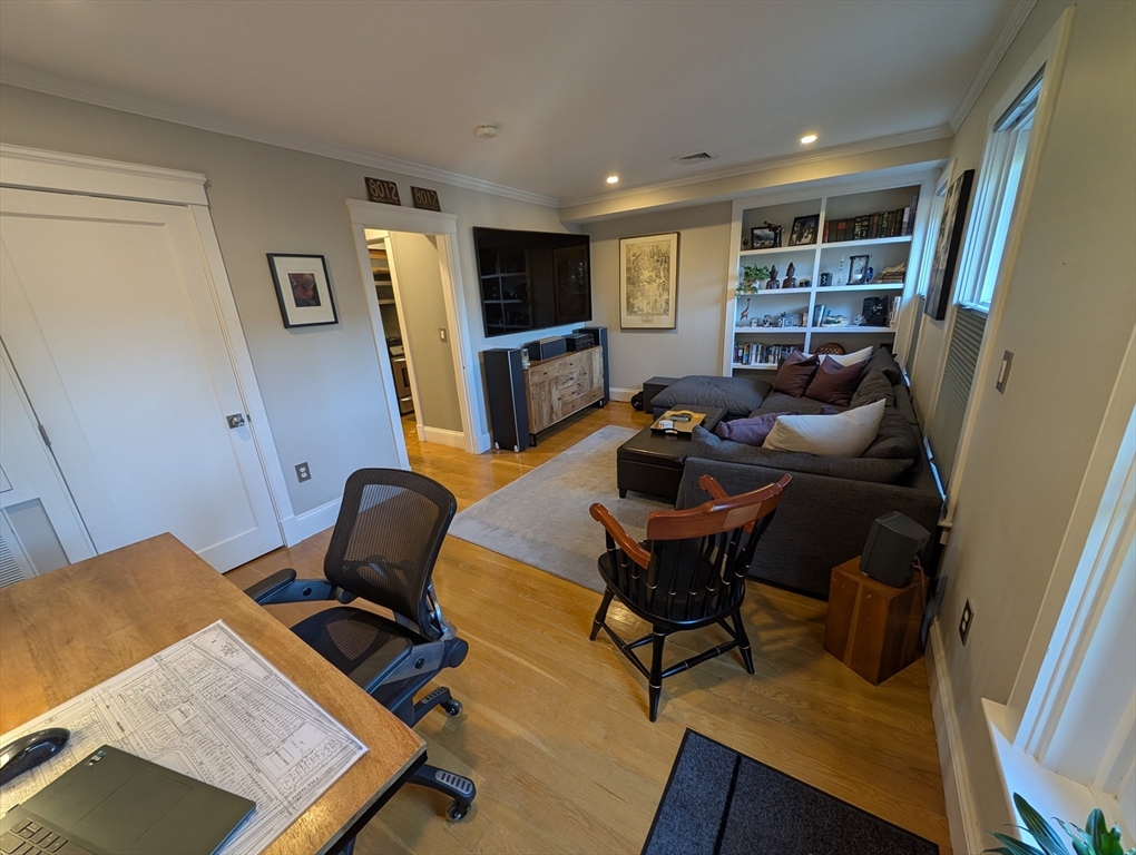 86 West Springfield Street, Unit 3 Boston, MA 02118 - Photo 13 of 39 a workspace with furniture and wooden floor