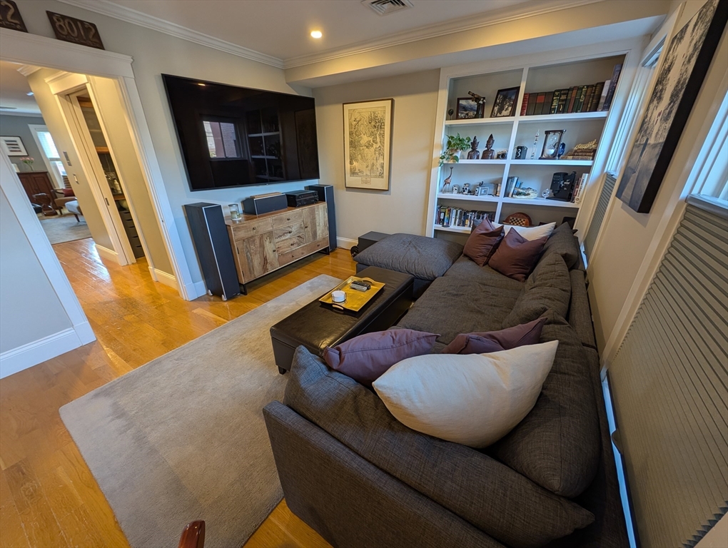 86 West Springfield Street, Unit 3 Boston, MA 02118 - Photo 14 of 39 a living room with furniture and a flat screen tv