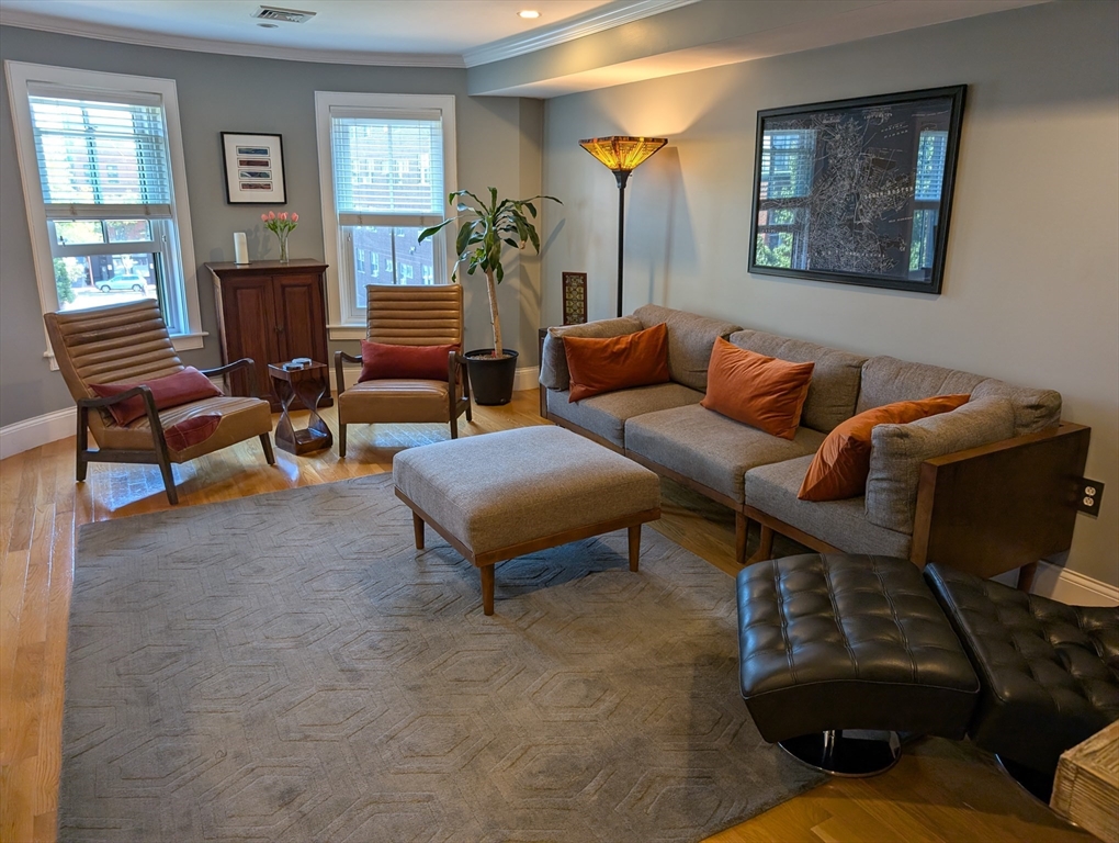 86 West Springfield Street, Unit 3 Boston, MA 02118 - Photo 2 of 39 a living room with furniture and a fireplace