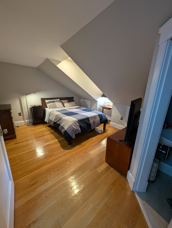 86 West Springfield Street, Unit 3 Boston, MA 02118 - Photo 28 of 39 a bed sitting in a bedroom next to a window