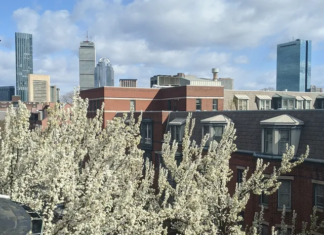 a view of a balcony with chairs