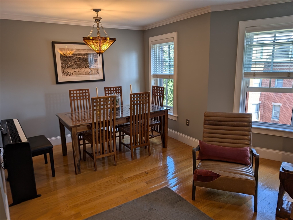 86 West Springfield Street, Unit 3 Boston, MA 02118 - Photo 7 of 39 a view of a livingroom with furniture window and wooden floor