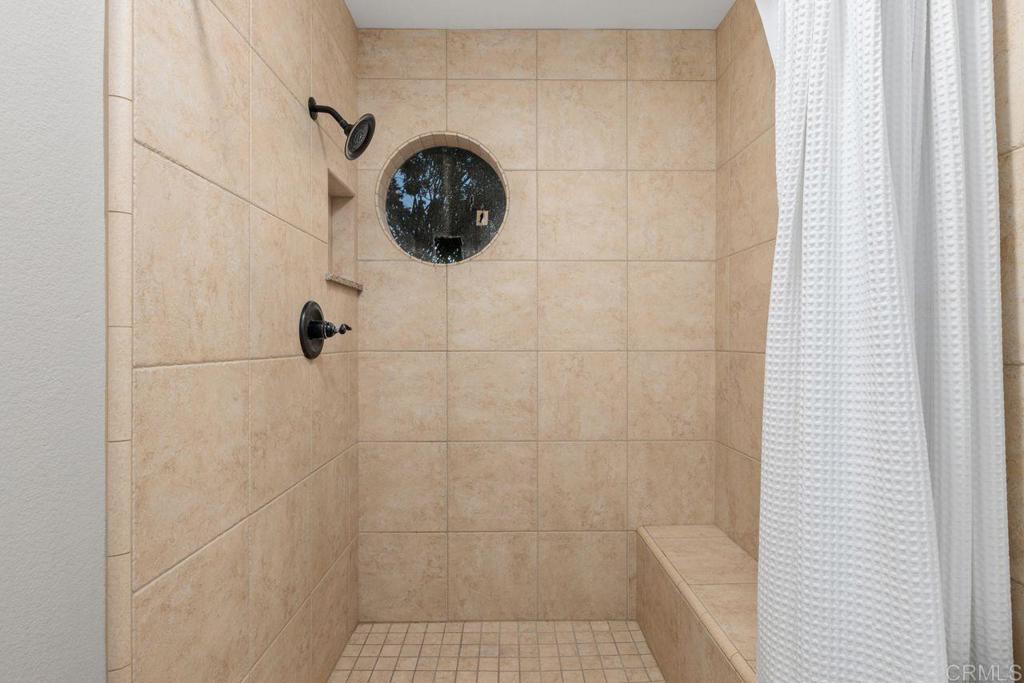 7325 Lantana Terrace Carlsbad, CA 92011 - Photo 20 of 36 a bathroom with a shower