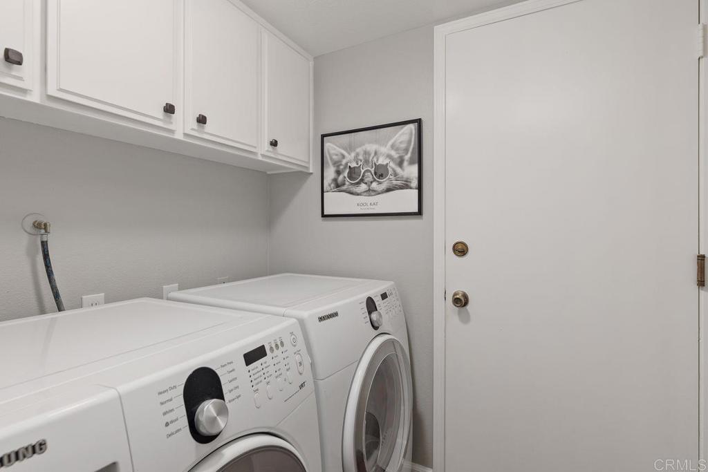 7325 Lantana Terrace Carlsbad, CA 92011 - Photo 24 of 36 a utility room with dryer and washer