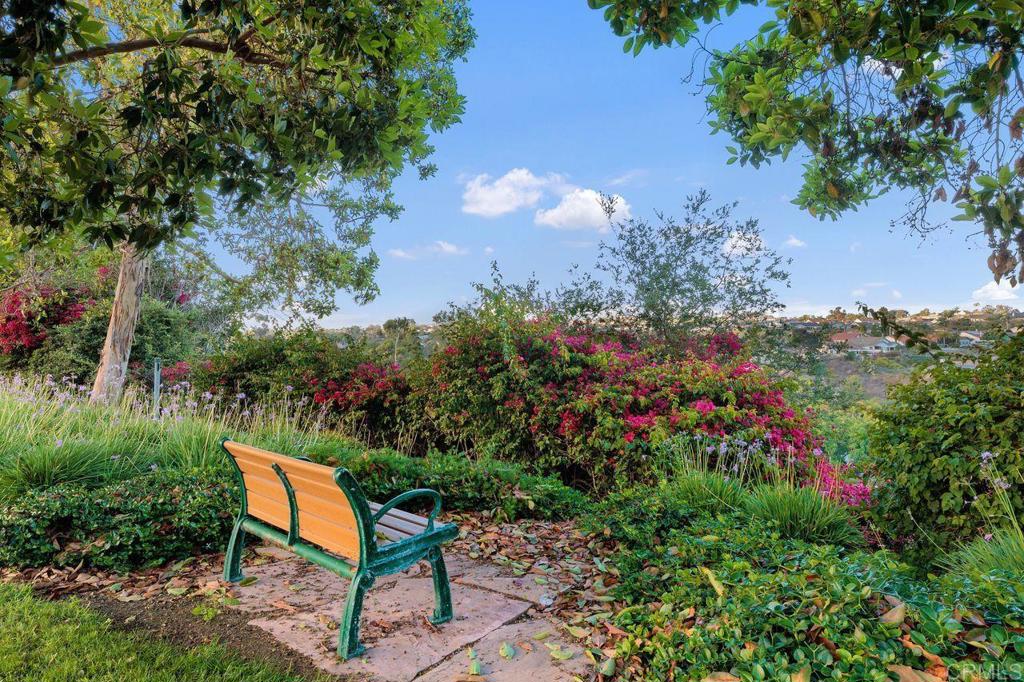 7325 Lantana Terrace Carlsbad, CA 92011 - Photo 28 of 36 a view of a bench in a garden