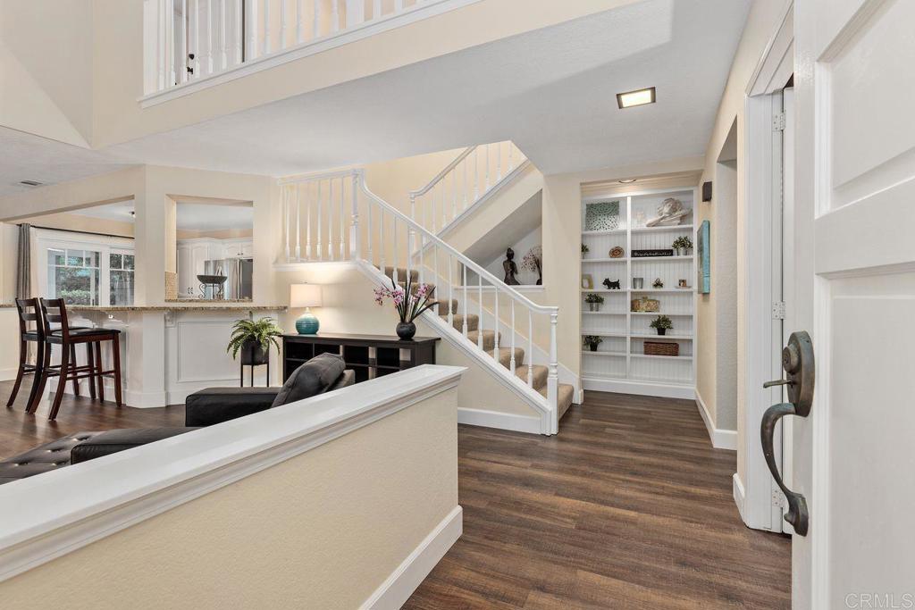 7325 Lantana Terrace Carlsbad, CA 92011 - Photo 5 of 36 a living room with furniture and wooden floor
