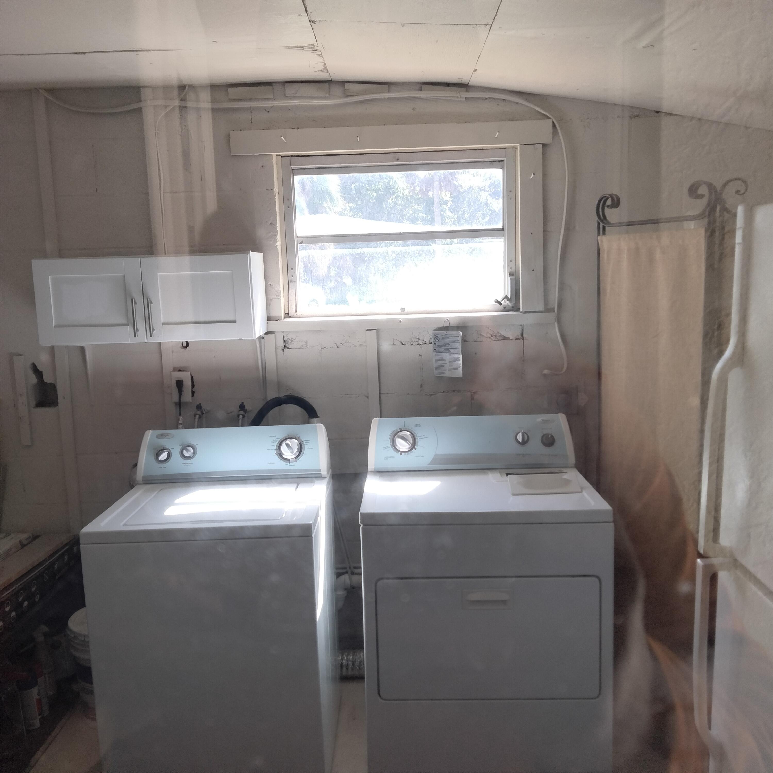 1150 Northeast County Line Road Jensen Beach, FL 34957 - Photo 15 of 17 Laundry Room