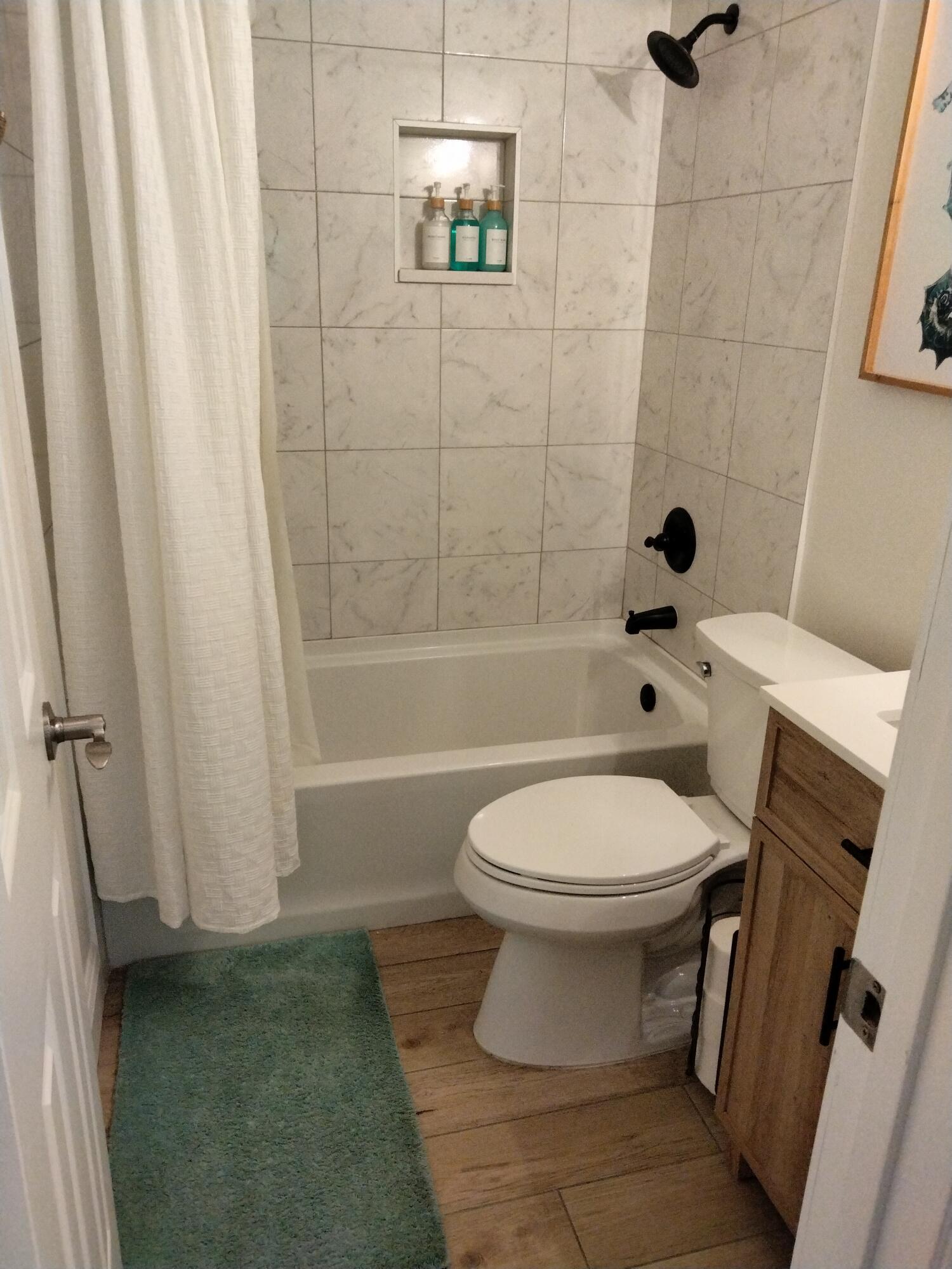1150 Northeast County Line Road Jensen Beach, FL 34957 - Photo 9 of 17 Bathroom 1