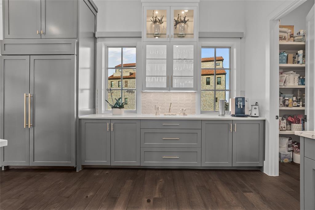 1 Piedra Court Roanoke, TX 76262 - Photo 15 of 40 a kitchen with cabinets and window