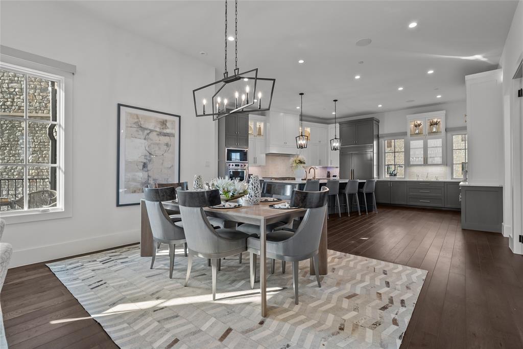 1 Piedra Court Roanoke, TX 76262 - Photo 17 of 40 a view of a dining room with furniture wooden floor and chandelier