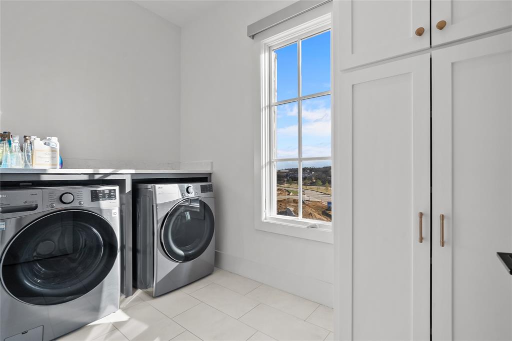 1 Piedra Court Roanoke, TX 76262 - Photo 22 of 40 a utility room with dryer and washer