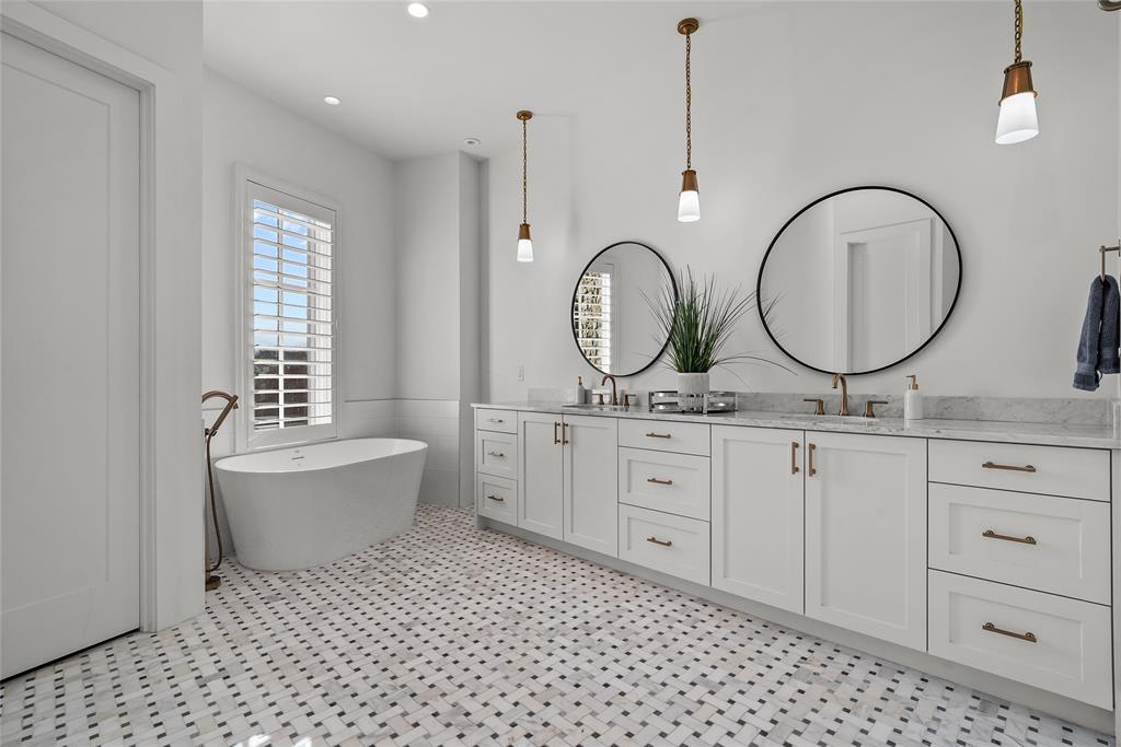 1 Piedra Court Roanoke, TX 76262 - Photo 27 of 40 a bathroom with a double vanity sink mirror and bathtub