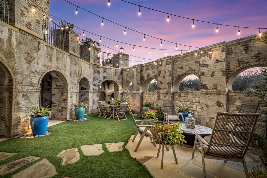 1 Piedra Court Roanoke, TX 76262 - Photo 3 of 40 a front view of a building with outdoor seating