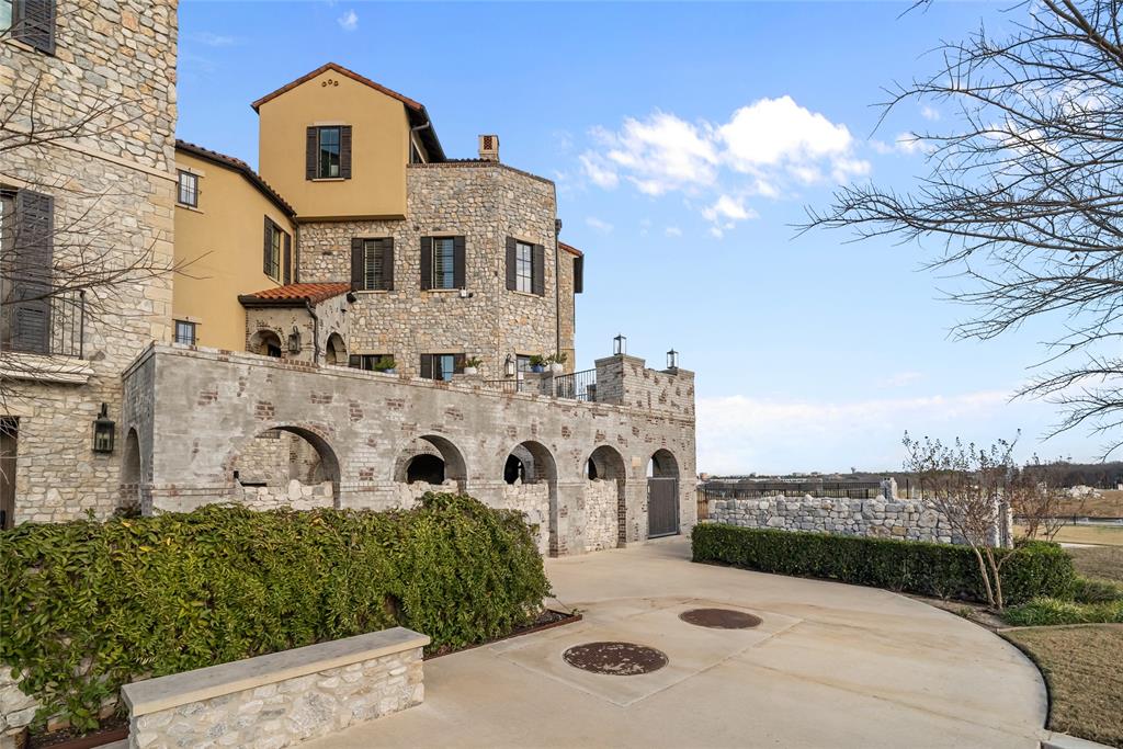 1 Piedra Court Roanoke, TX 76262 - Photo 39 of 40 a front view of a house with a yard