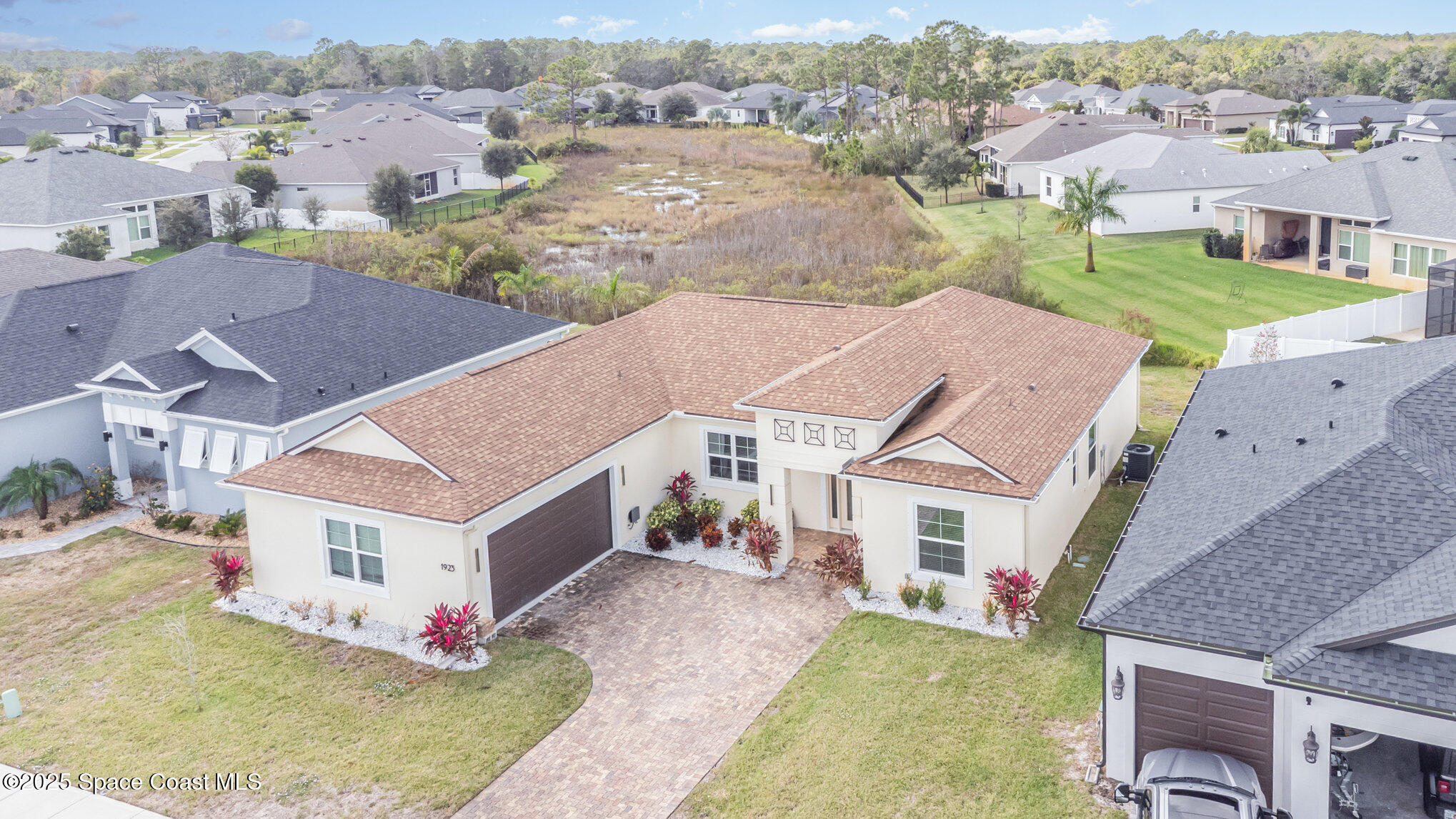 1923 Crossbill Drive Titusville, FL 32796 - Photo 28 of 31 030_dji_0118-edit_606