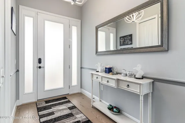 a room that has a dresser in it