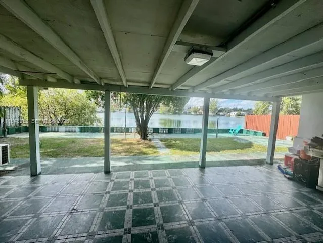 a view of a lake with a bench in front of it