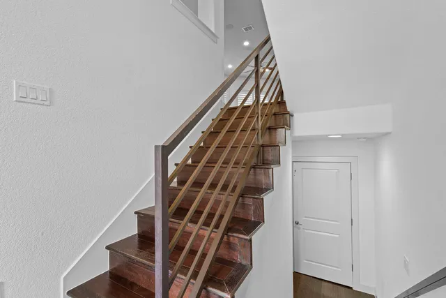 a view of entryway with wooden floor