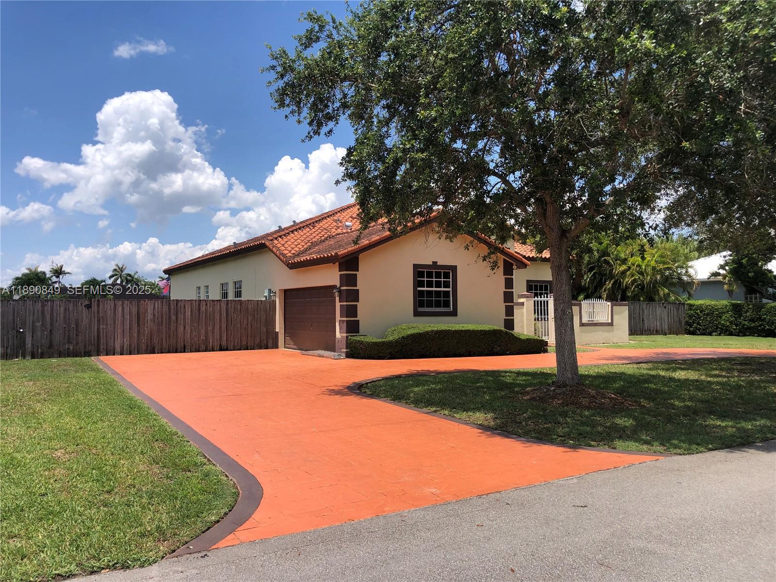 18721 Southwest 291st Terrace Homestead, FL 33030 - Photo 4 of 15 a view of an house with backyard space and garden