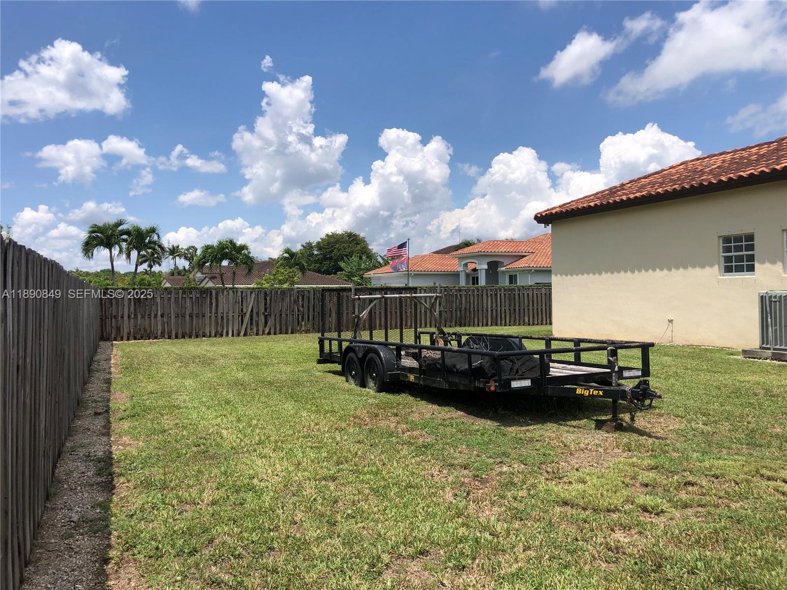 18721 Southwest 291st Terrace Homestead, FL 33030 - Photo 5 of 15 a view of a yard with a house