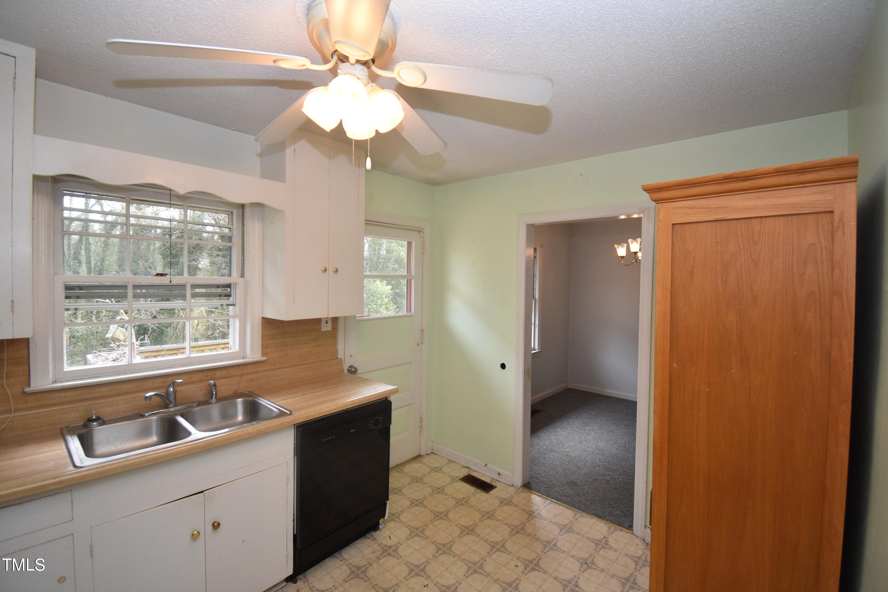 6115 Lake Wheeler Road Raleigh, NC 27603 - Photo 8 of 22 a bathroom with a sink a vanity and a mirror