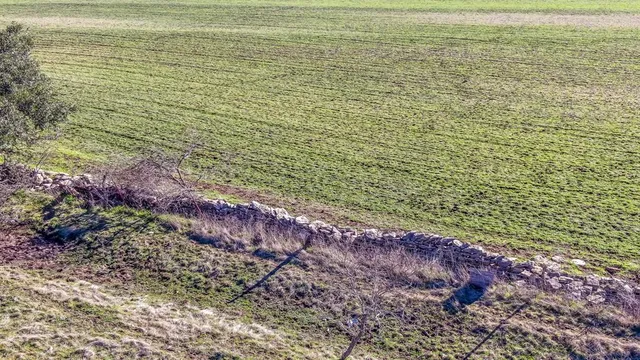 a view of a lake view with houses in back