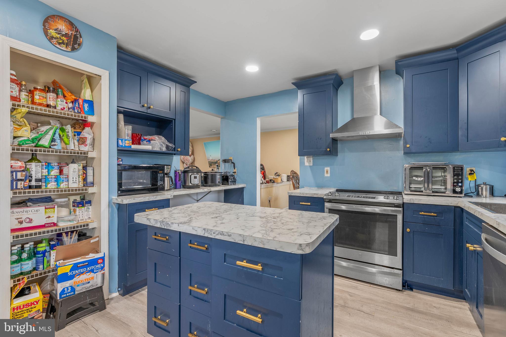 1012 Franklin Avenue Croydon, PA 19021 - Photo 12 of 25 a kitchen with stainless steel appliances granite countertop a stove and cabinets