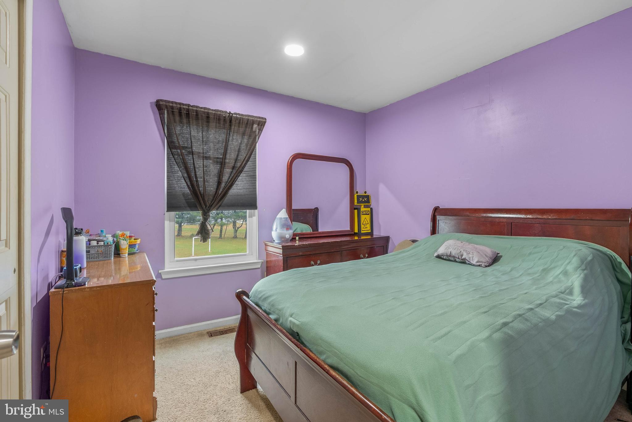 1012 Franklin Avenue Croydon, PA 19021 - Photo 15 of 25 a bedroom with a bed and a dresser with mirror