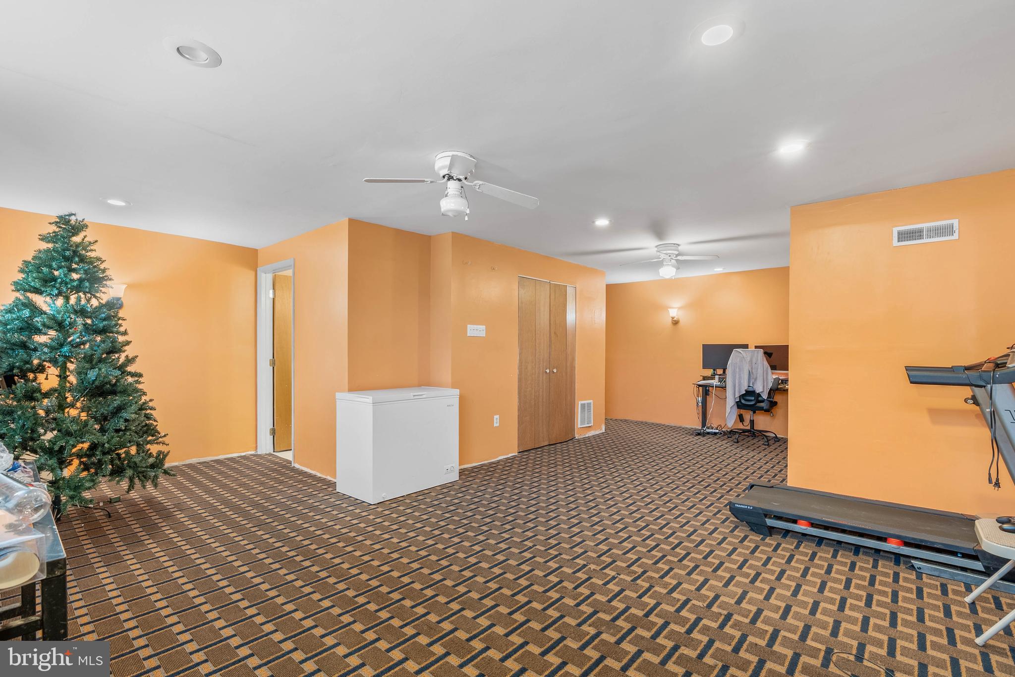 1012 Franklin Avenue Croydon, PA 19021 - Photo 19 of 25 a bedroom with a bed and a couch