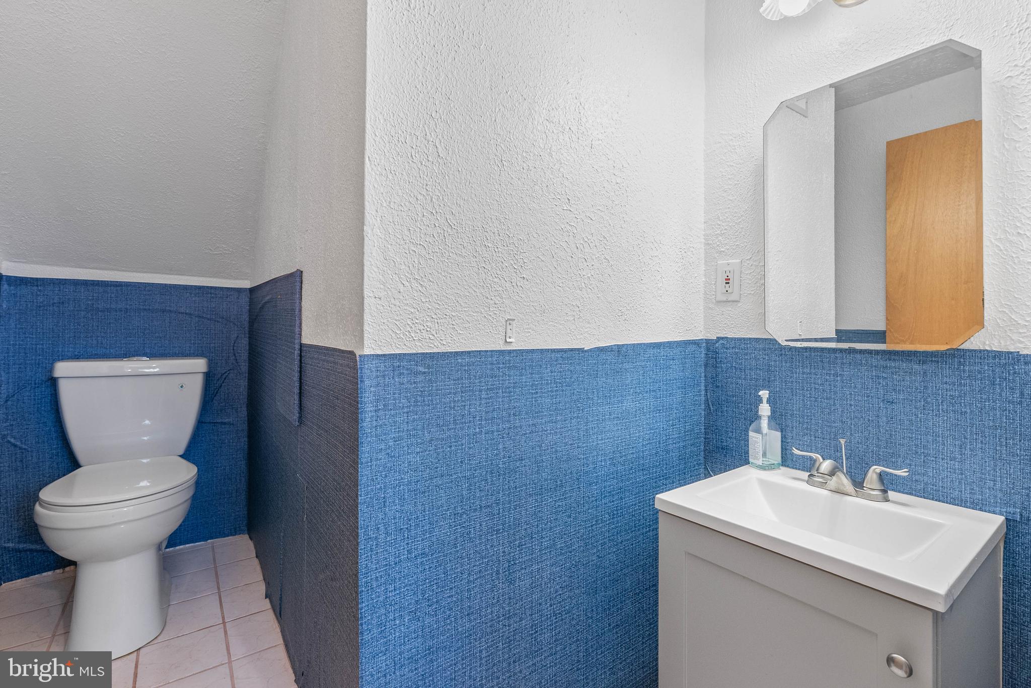 1012 Franklin Avenue Croydon, PA 19021 - Photo 21 of 25 a bathroom with a toilet sink and mirror