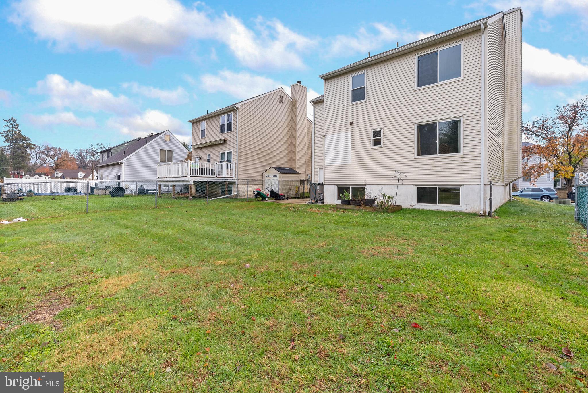 1012 Franklin Avenue Croydon, PA 19021 - Photo 23 of 25 a view of a house with a big yard and large trees