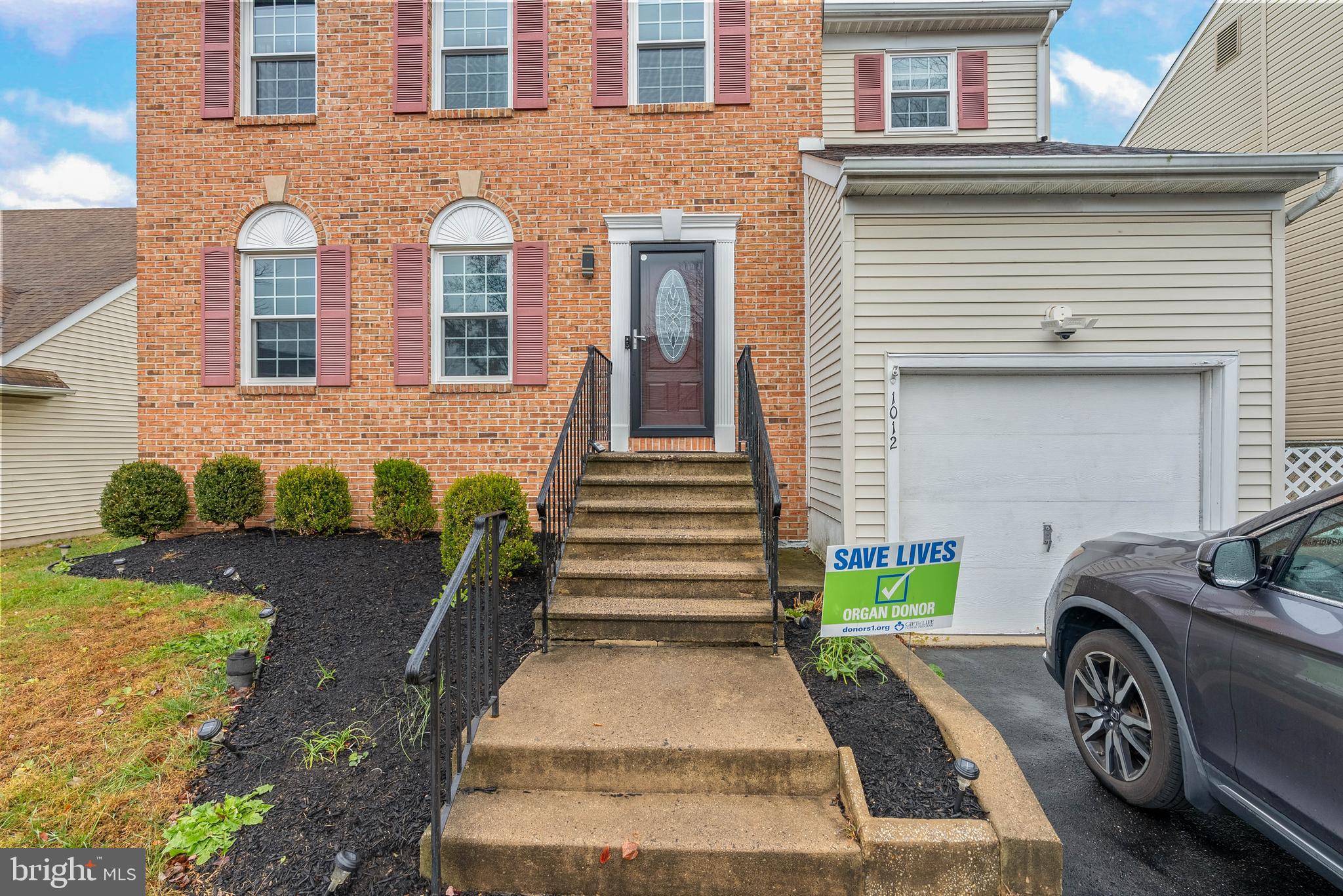 1012 Franklin Avenue Croydon, PA 19021 - Photo 3 of 25 a front view of a house with a yard