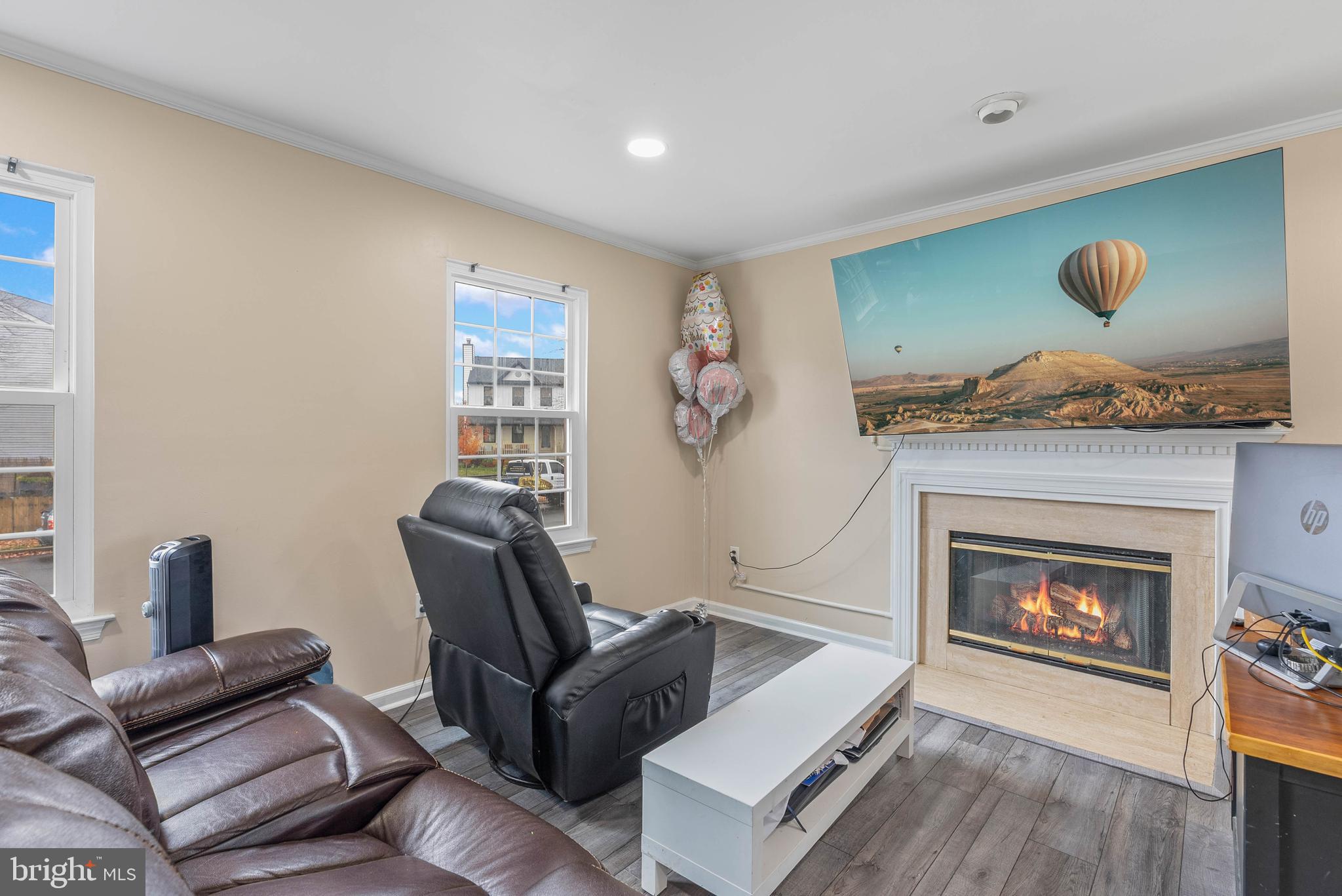 1012 Franklin Avenue Croydon, PA 19021 - Photo 5 of 25 a living room with furniture and a fireplace