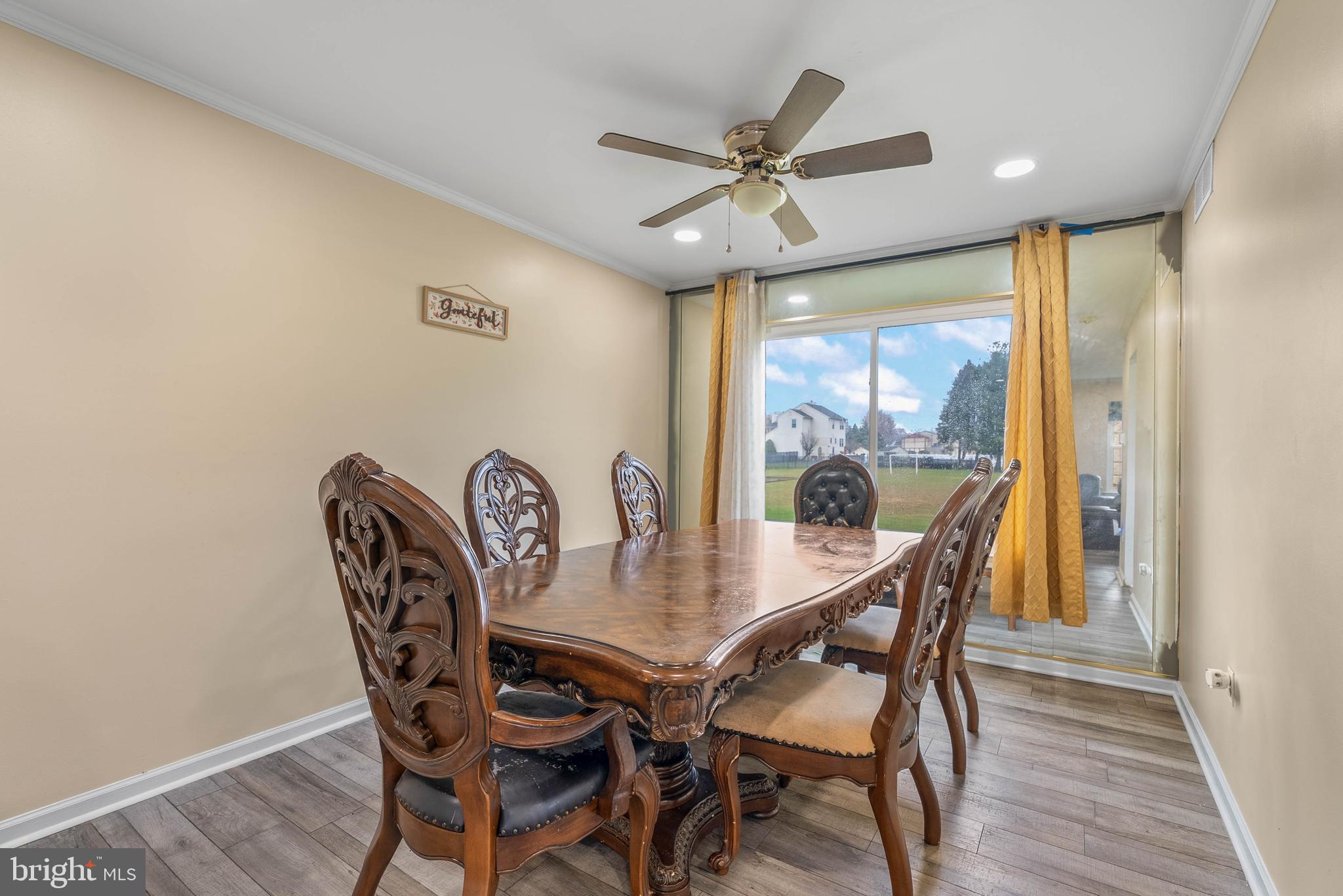 1012 Franklin Avenue Croydon, PA 19021 - Photo 7 of 25 a view of a dining room with furniture window and wooden floor