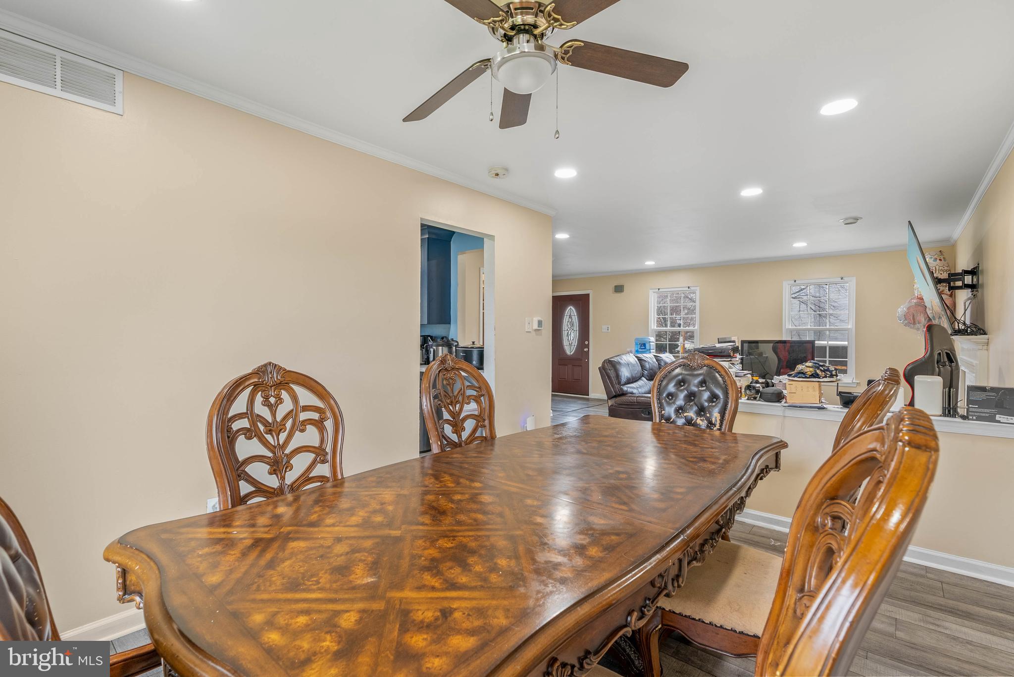 1012 Franklin Avenue Croydon, PA 19021 - Photo 8 of 25 a dining room with furniture and a chandelier