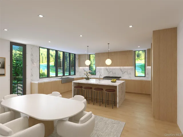 a kitchen with a stove a sink a dining table and chairs