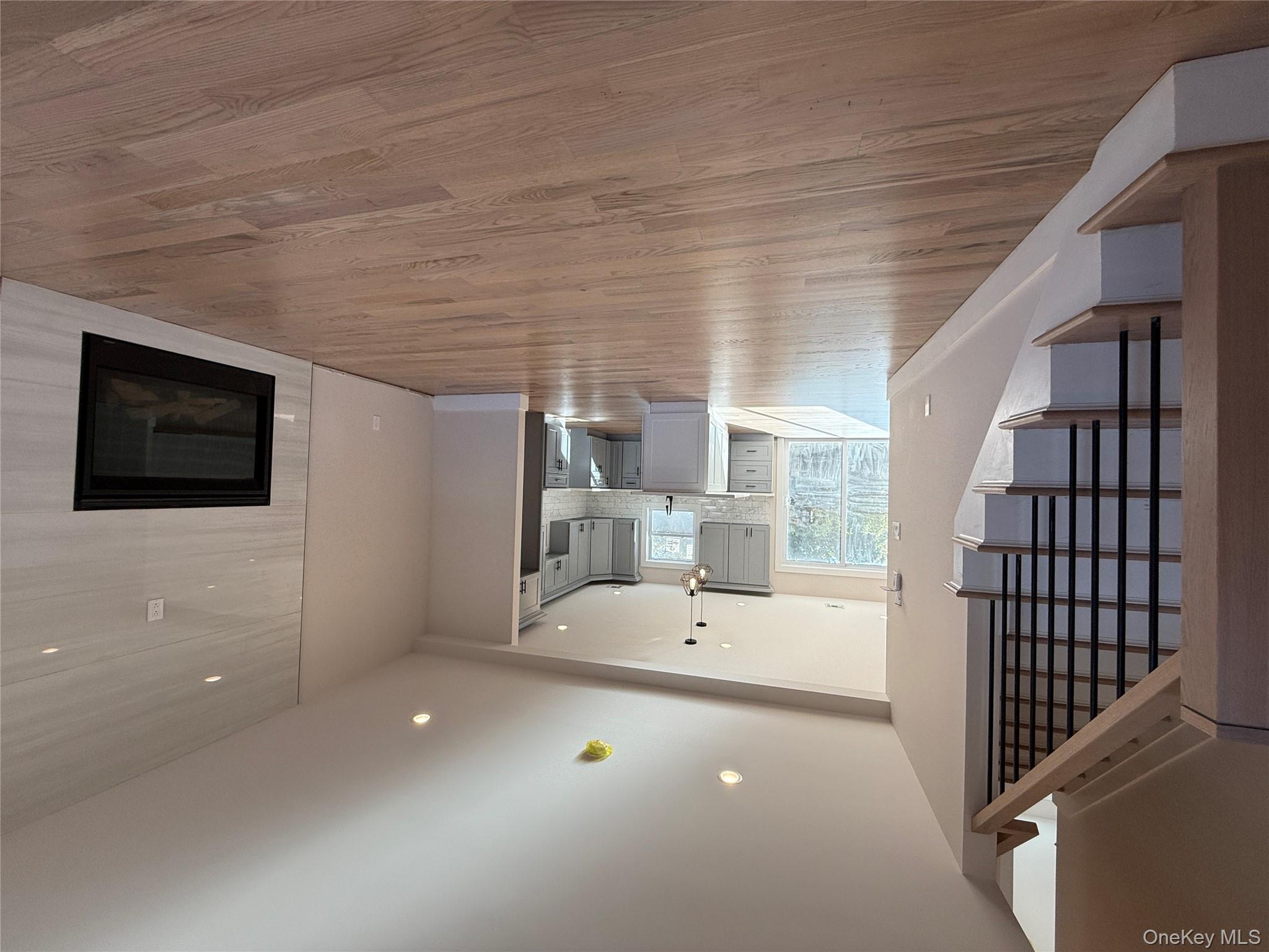 New Construction Rugby Drive Shirley, NY 11967 - Photo 3 of 17 a view of a kitchen with a sink and a microwave